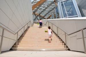 Kids make their own promenade in the Frank Gehry's building